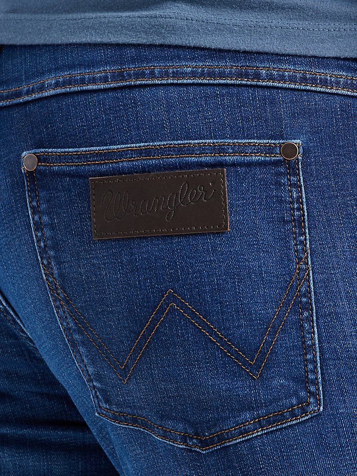 Men's Wrangler Free To Stretch Greensboro Jean in Rodeo Bull